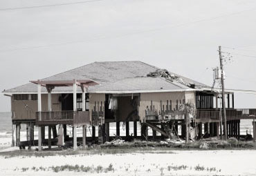 wind damage - spray foam can help prevent uplift to Plano roofs